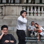 Workers “take a break” in a Manhattan park.
