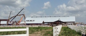 Texas A&M accident This photo provided by KBTX-TV shows damage to the Texas A&M University equestrian center on Saturday, June 22, 2013 near College Station, Texas. A portion of the equestrian center under construction has collapsed.