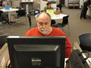 Richard Mattos, 59, looks for jobs at a state-run employment center in Salem, Ore., on Thursday, Dec. 26, 2013. Mattos is one of more than 1 million Americans who will lose federal unemployment benefits at year's end. Photo: Jonathan J. Cooper, AP