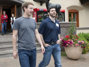 Facebook CEO Mark Zuckerberg, left, walks with Jeff Weiner, CEO of LinkedIn at the Sun Valley Inn during the 2011 Allen and Co. Sun Valley Conference
