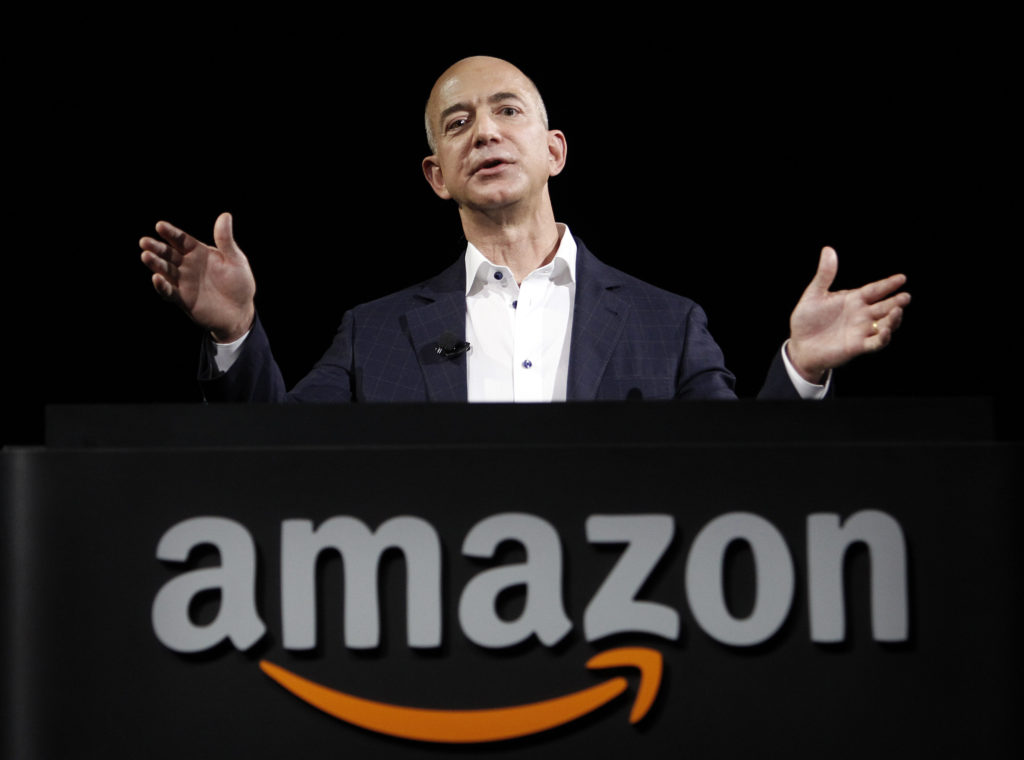 Jeff Bezos speaking at an amazon podium