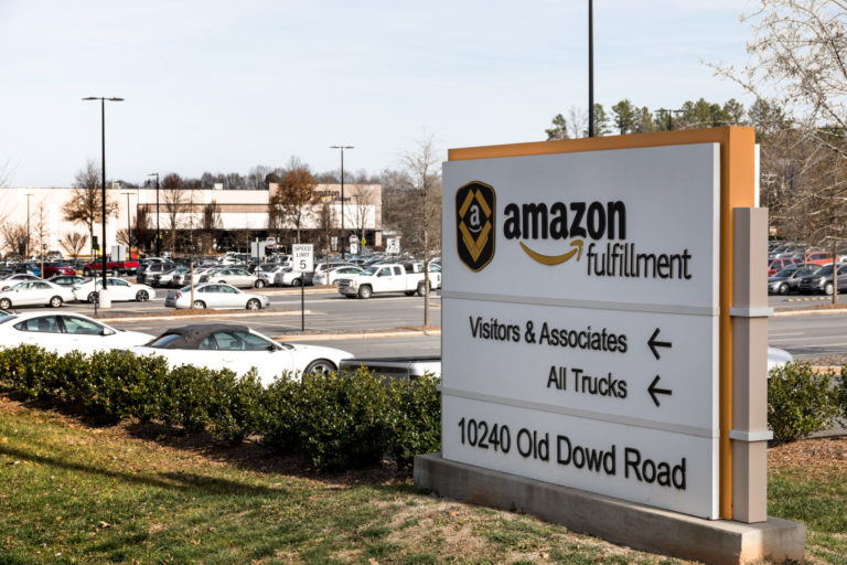 Amazon keeps quiet on Washington proposal to hike workers