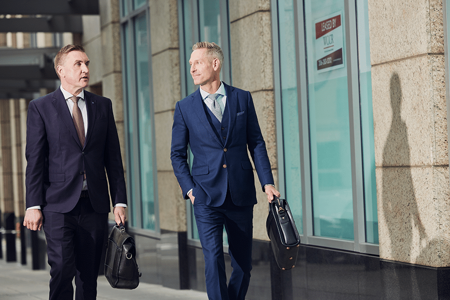 timothy emery and patrick reddy walking in downtown seattle