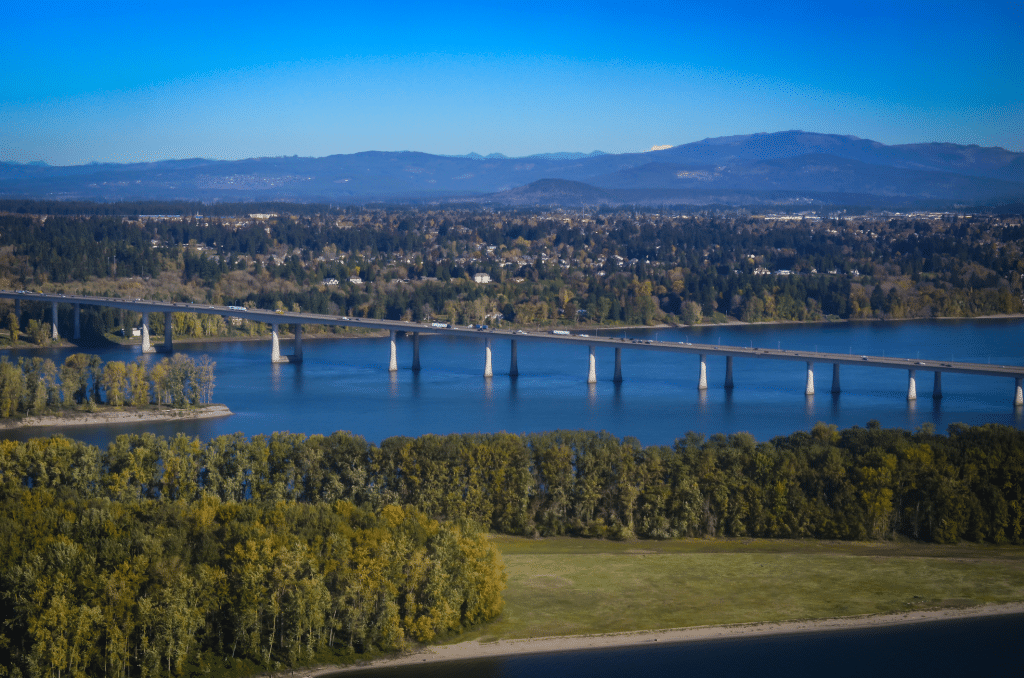 Interstate Highway connecting bridge over the Columbia River, connecting Oregon and Washington. Scenic view of countryside.