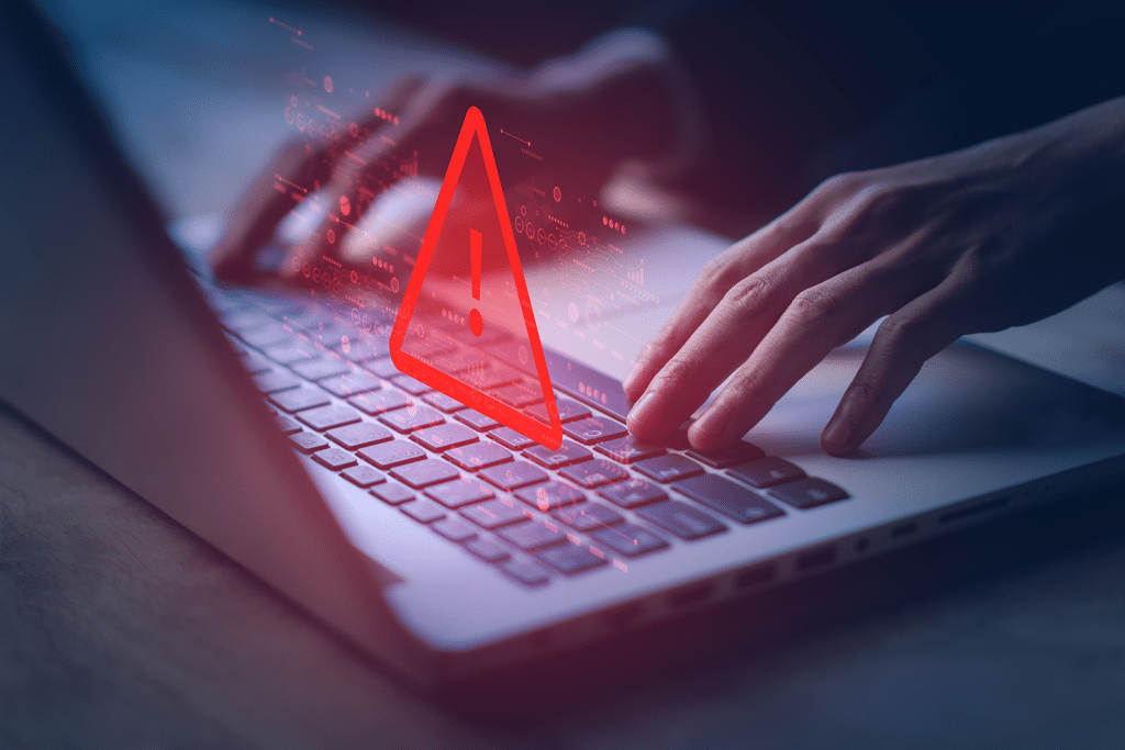 data breach cyberattack privacy breach warning on a laptop