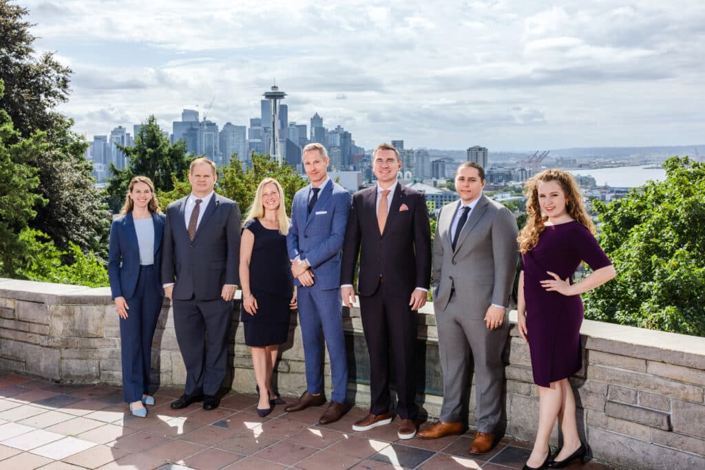 The Emery | Reddy team at Kerry Park in Seattle with the skyline behind them