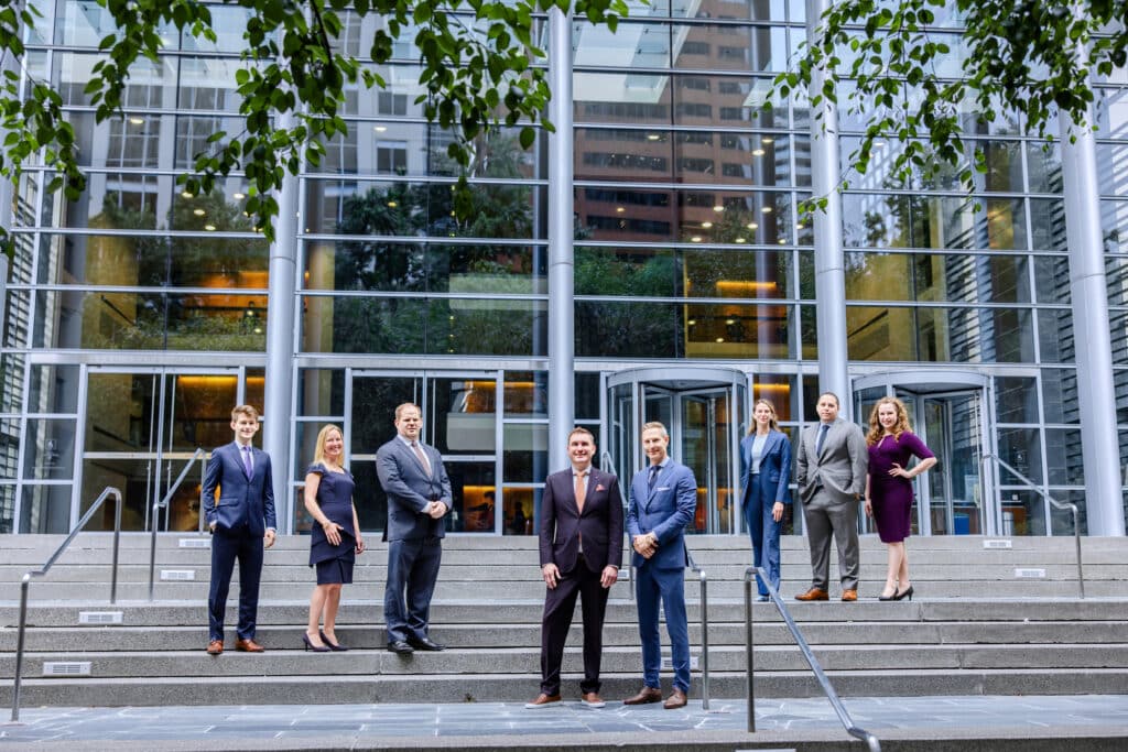 Emery | Reddy Seattle Team in front of Seattle Courthouse
