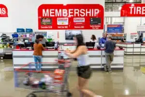 The membership counter inside a Costco store in Napa, Calif. A new lawsuit seeks to ensure that Costco will pass tariff refunds to buyers. (David Paul Morris / Bloomberg, file)
