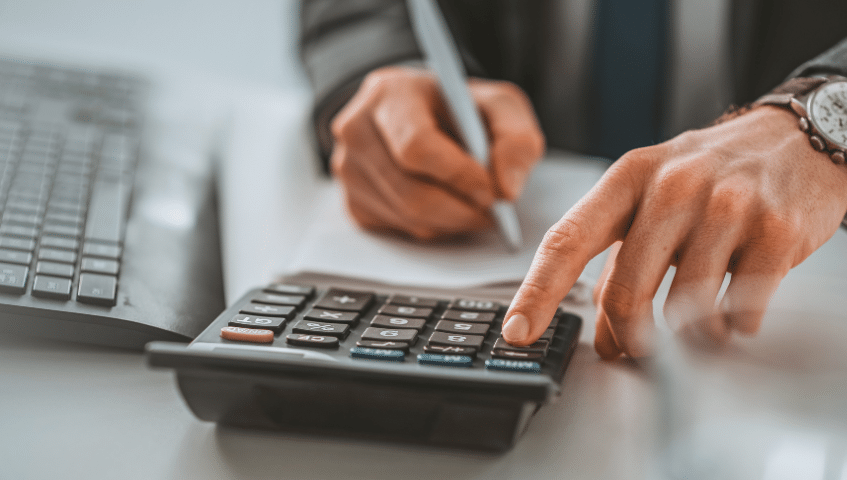 A lawyer calculates line items.