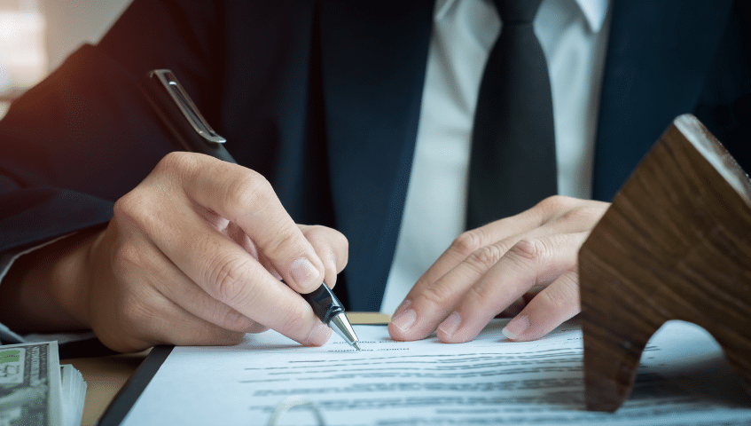 A lawyer calculates line items.